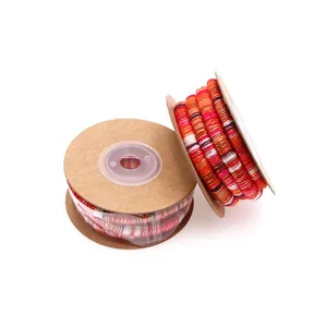 Detailed view of colorful ethnic style wrapped core cord for DIY crafts and accessories.