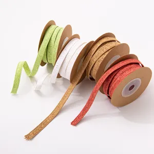 Eco-friendly 10mm woven paper ribbon rolls for gift wrapping, flower packaging and crafts.