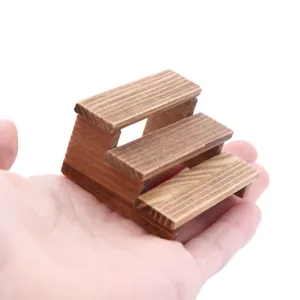 Miniature wooden 3-step display stand detail shot, showing natural wood texture and size.