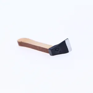 Miniature wooden axe toy dollhouse garden tool accessory detailed close-up shot for display