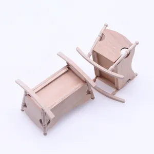 Miniature wooden rocking bed model for dollhouse, detailed tiny furniture prop for DIY craft.