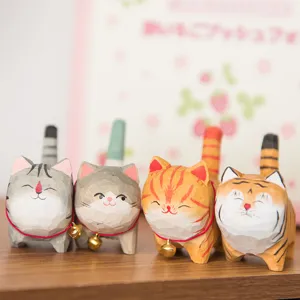 Handcrafted wooden cat figurine set, cute desktop animal ornaments for home decor and gifts.