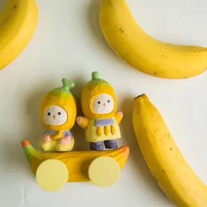 Wooden banana car figurine detail, handmade basswood carving, cute desktop decor, creative gift.