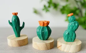 Handcrafted wooden cactus ornament set with natural round wood base, perfect creative gift.