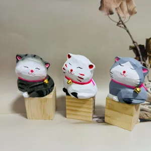 Handcrafted wooden cat figurine set, creative desktop ornament for home decor and birthday gifts.