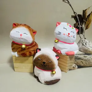 Handcrafted wooden cat figurine detail, cute hand-carved animal sculpture for home decor.