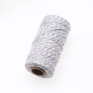 Detailed close-up of 2mm two-color cotton twine, perfect for gift wrapping and crafts.