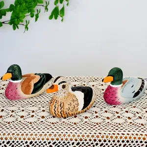 Handcrafted wooden duck figurines, hand-painted desktop ornaments for home and office decor.