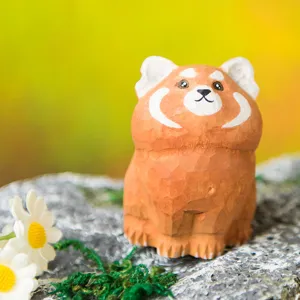 Hand-carved wooden red panda figurine, cute animal desktop decoration for home office decor.