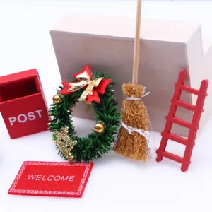 Dollhouse miniature Christmas decoration set with mini mailbox, wreath, broom and ladder.