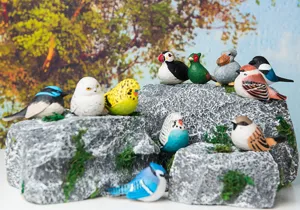 Handmade wooden bird figurine set, cute carved animal ornaments for home decor and display.