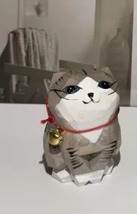 Hand-carved wooden cat figurine desktop ornament featuring a red string and golden bell.