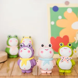 Handcrafted wooden frog figurines, colorful animal ornaments for home decor and holiday gifts.