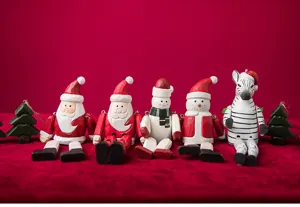 Wooden Christmas ornaments set featuring cute Santa, snowman and zebra figures for holiday decor.