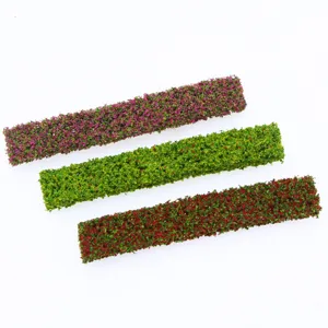 Vista detallada de tiras de setos en miniatura para jardin de casa de munecas micro paisaje.
