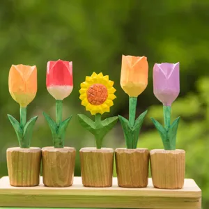 Close-up of handmade wooden carved flower ornaments, colorful tulip and sunflower decor.