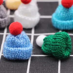 Mini knitted wool hat with pompom, perfect for DIY handmade hair clip jewelry accessories.