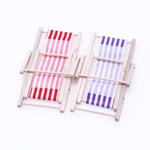 Miniature wooden beach chair detail view, perfect for dollhouse furniture and micro landscape.
