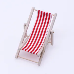 Miniature wooden beach chair detail, red and white striped fabric, dollhouse micro scene decor