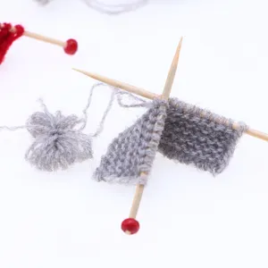Miniature knitted sweater detail, dollhouse BJD sewing prop and tiny wool craft model.