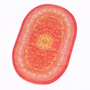 Miniature oval woven carpet detail, traditional Turkish dollhouse rug decoration.
