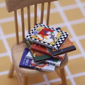 Miniature book stack detail shot for dollhouse study room decoration, cute tiny model.