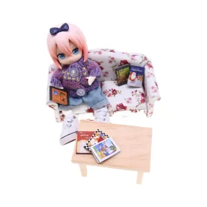Miniature dollhouse living room set with pink hair BJD doll sofa wooden table and tiny books