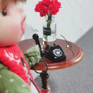 Miniature dollhouse retro alloy telephone model simulation doll bedroom scene toy ornament.