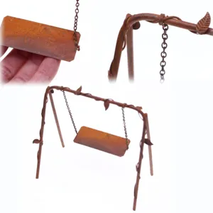 Miniature rusty metal swing detail shot, perfect for dollhouse gardens and micro landscape decor.