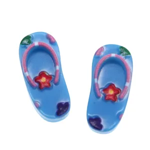 Miniature resin flip flops detail view for dollhouse beach scene and toy accessories.