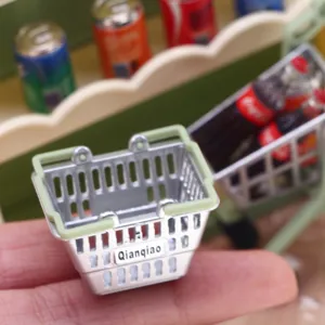 Miniature dollhouse metal shopping basket doll house supermarket accessory prop detail view.