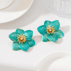 Boucles d'oreilles fleurs en métal turquoise vintage avec strass pour style vacances.