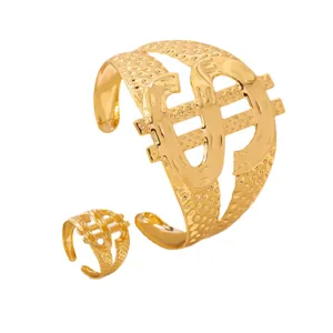 Gold dollar sign cuff bracelet and ring set, hip-hop style metal fashion jewelry.