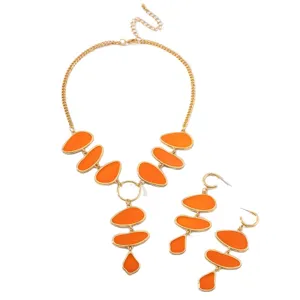 Chic orange drip oil oval pendant necklace and long earrings jewelry set for women party.