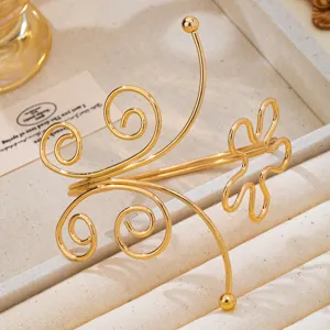 Brazalete manguito abierto flor espiral chapado oro vintage francés detalle.
