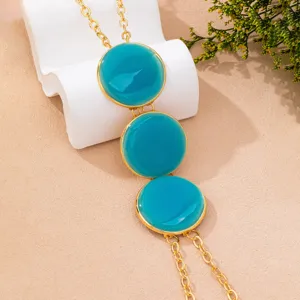 Blue enamel round disk gold chain body chain detail, summer beach party fashion jewelry.
