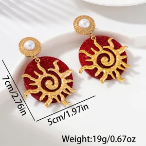 Boucles d'oreilles pendantes soleil or vintage avec paillettes rouges et perle mode.