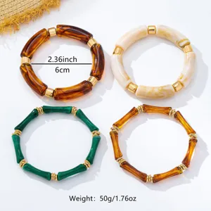 Closeup of translucent acrylic bamboo resin stackable bracelets in multi colors with size.