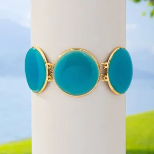 Blue enamel round metal chain bracelet detail shot, perfect for summer beach resort styling.