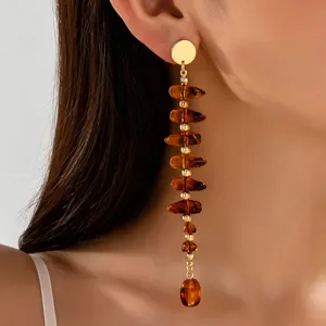 French vintage brown beaded drop earrings detail close up, elegant metallic and resin jewelry