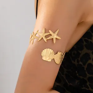 Elegante goldene Seestern und Muschel Armspange Armreif fuer den Sommer Strand Urlaub