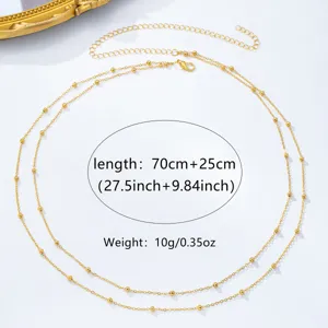 Goldene doppellagige Perlen-Taillenkette Detailansicht mit präzisen Längen- und Gewichtsangaben.