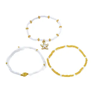 Ensemble de bijoux de bracelet de perles multicouches coquillage étoile de mer plage.