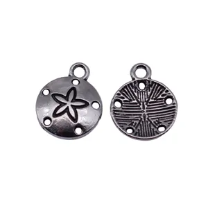 Sand dollar metal pendant DIY jewelry accessory, antique silver finish, detailed back and front.