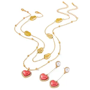 French retro double layer necklace long earrings set with pink heart and gold irregular beads.