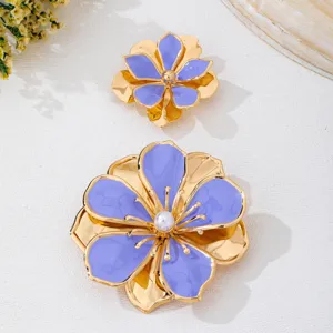 Exquisite purple enamel flower brooch with gold tone finish, perfect for summer vacation chic style.