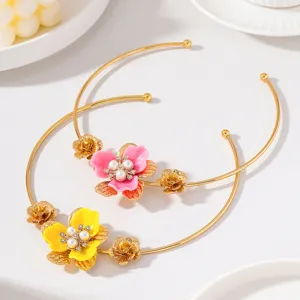Close-up detail of french style floral choker necklace with pearls rhinestones elegant design.