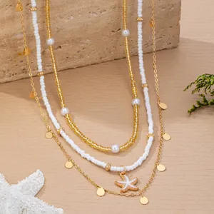 Multi-layer beaded starfish waist chain, beach vacation style, sequin tassel jewelry detail.