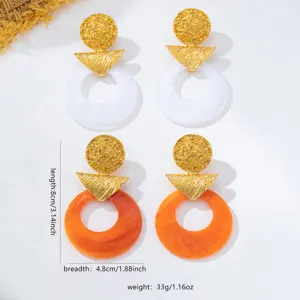 Boucles d'oreilles en résine texturée creuse ambre style rétro hong-kongais uniques chic.