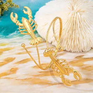 Goldfarbene Hummer Wickel Armreif Armband, atemberaubender Strand Urlaub Schmuck Stück.